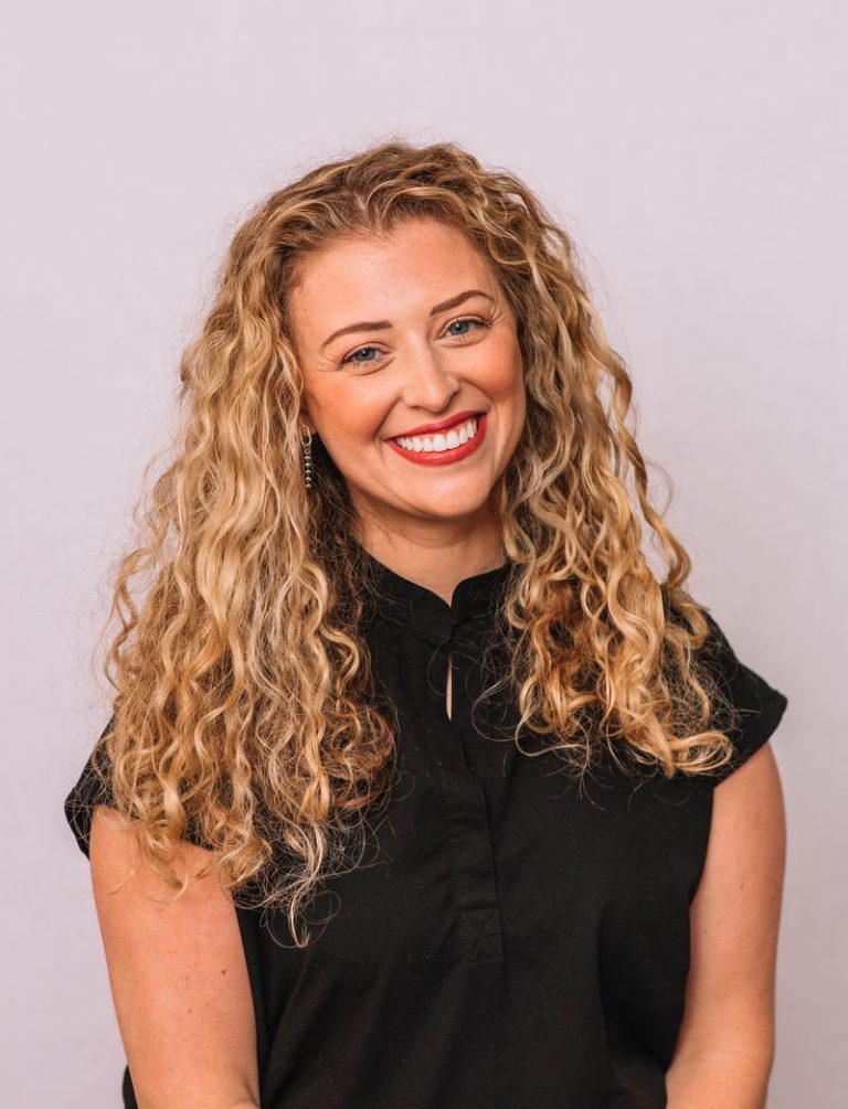 Dr. Alexis Meyers, pediatric dentist, smiling